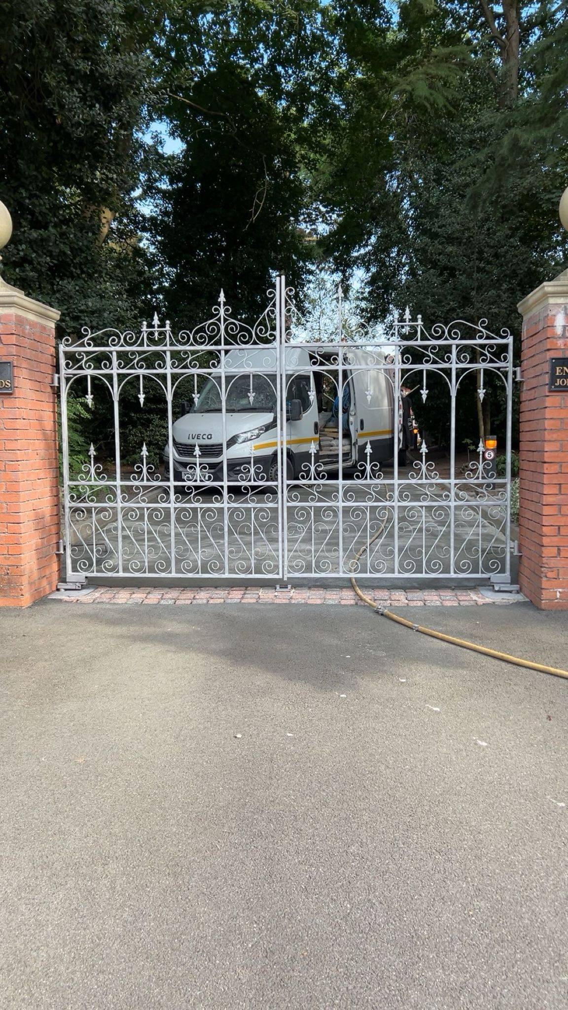 Metal gate after shot blasting with rust completely removed and clean surface profile