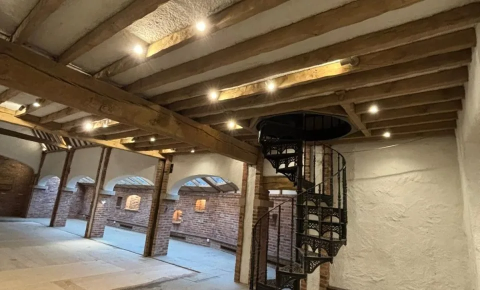 Clean restored A-frame timber with paint and staining removed