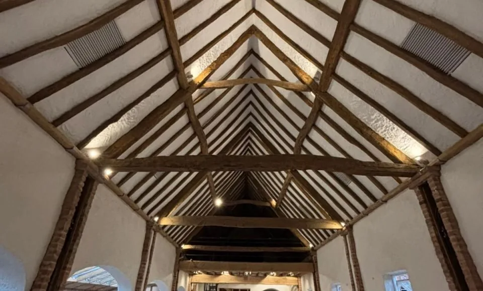 Historic A-frame detail showing an even cleaned timber finish
