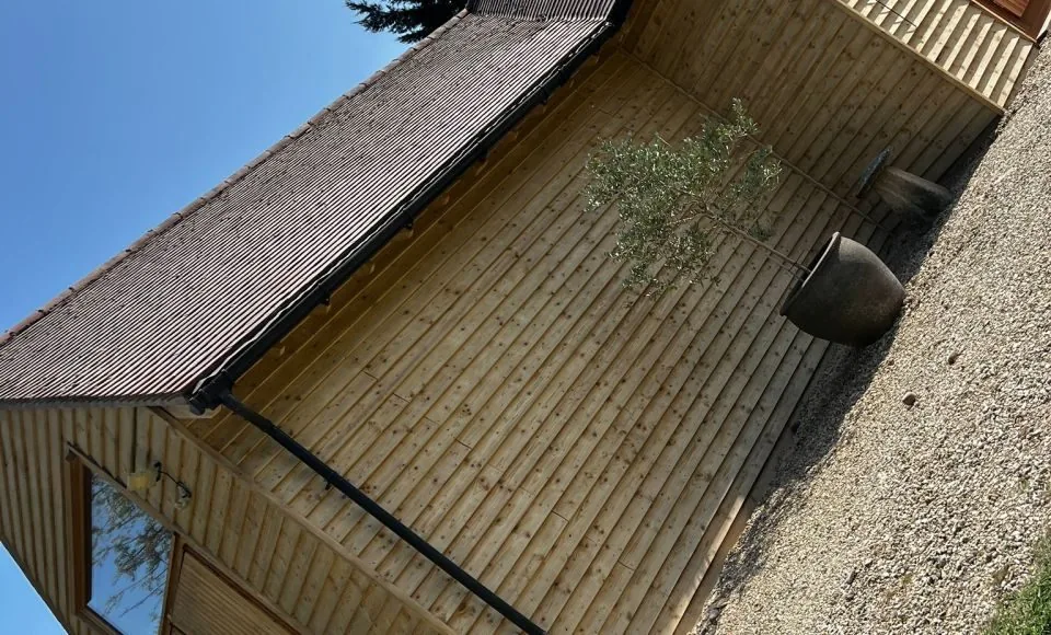 Revived exterior timber cladding with a cleaner, more even natural surface