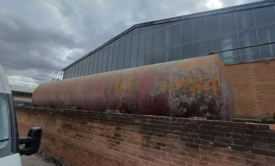 Industrial steel tank after gentle surface preparation with a clean, even coating-ready finish