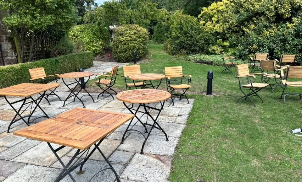 Clean evenly prepared outdoor steel tables and chairs after gentle restoration