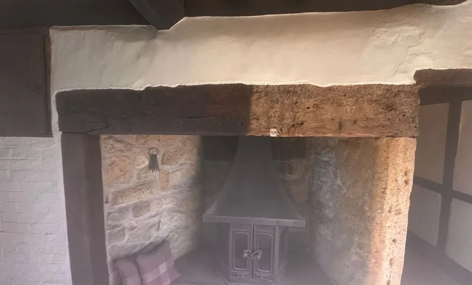 Brightened interior showing naturally refreshed oak beams after cleaning