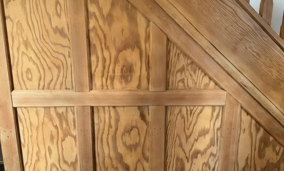 Traditional staircase after light restoration with a cleaner, more even timber surface and preserved joinery detail