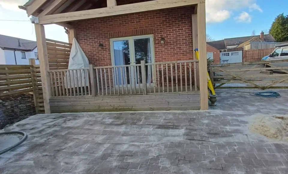 Cleaned apex timber building exterior showing brighter natural surfaces after gentle restoration