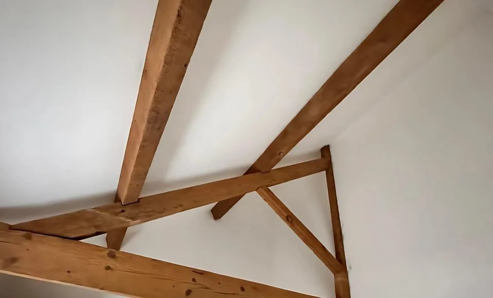 Refreshed roof timbers and purlin junctions after controlled gentle cleaning