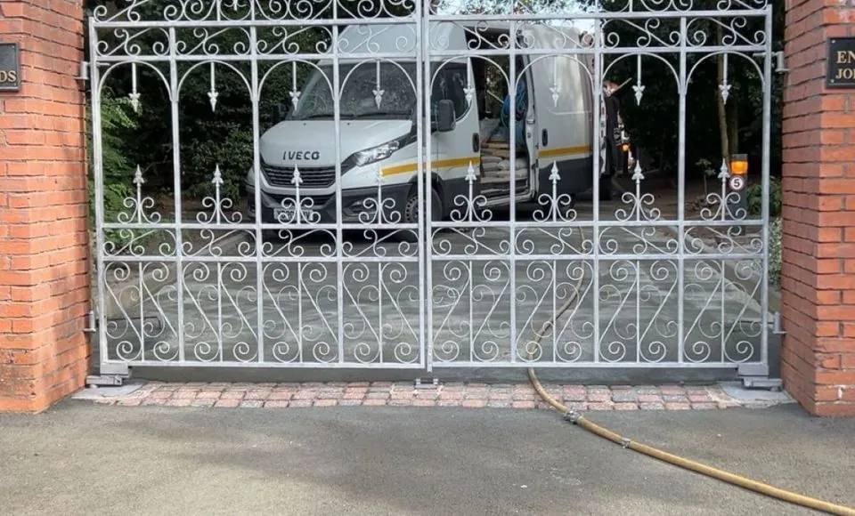 Clean metal gate with an even metallic finish ready for primer and protective coating