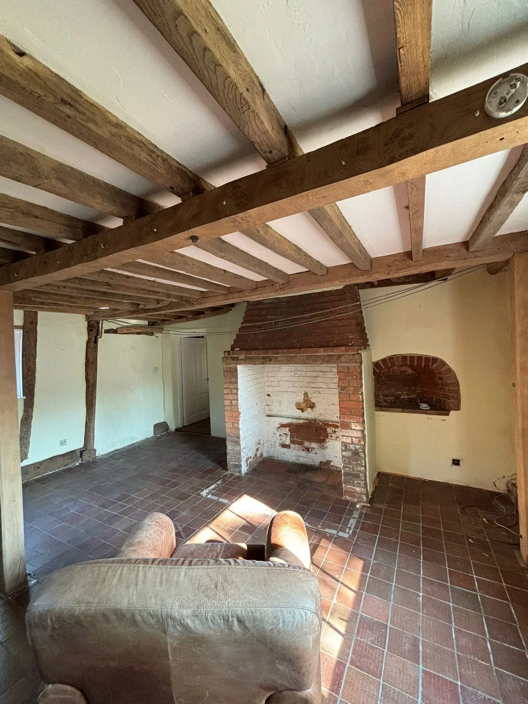 Additional restored view of historic cottage oak frame and ceiling beams