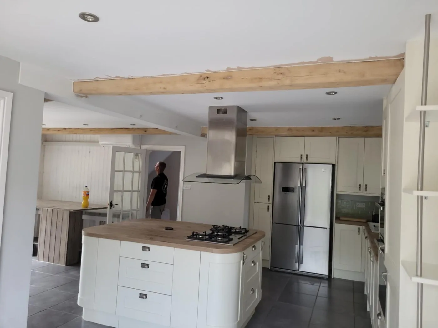 Cleaned interior beams revealing natural timber grain and detail