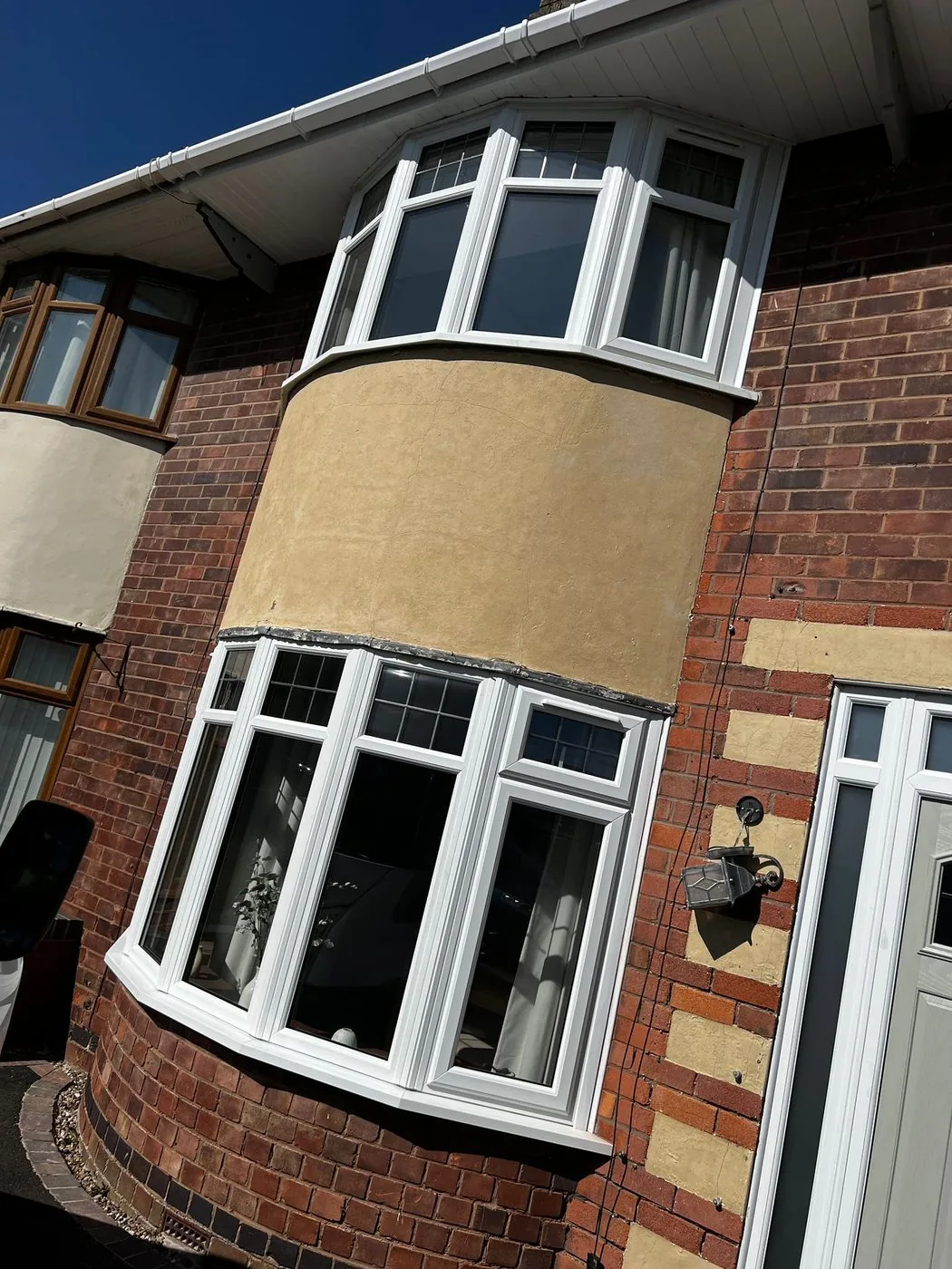Restored entrance surround with defined natural stone detailing