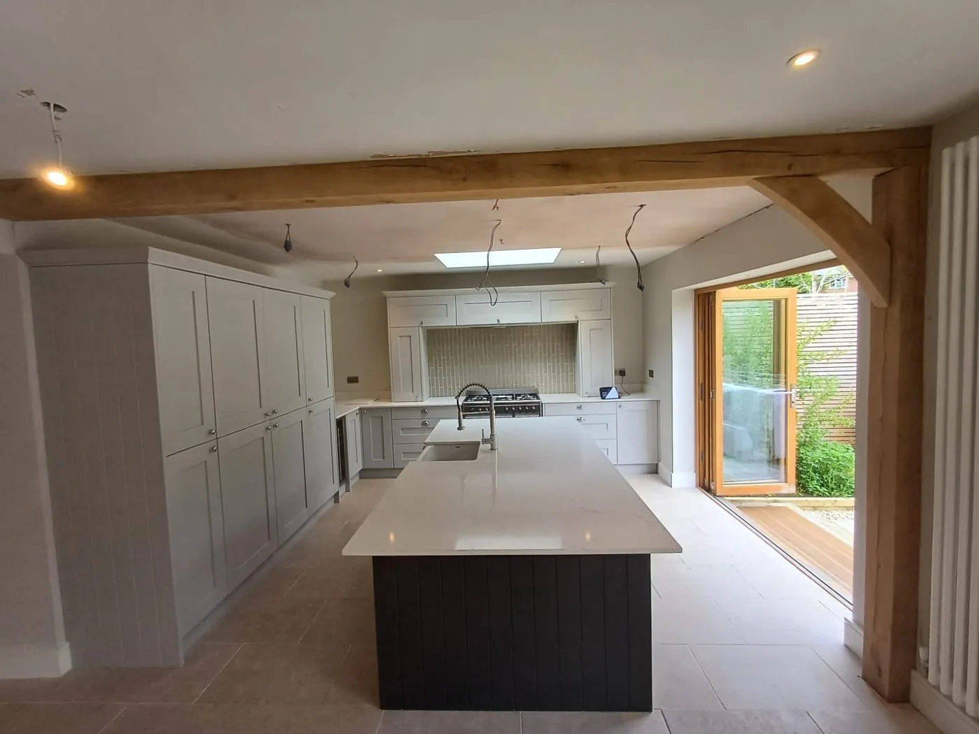 Prepared oak frame within a bright finished home interior ready for final treatment