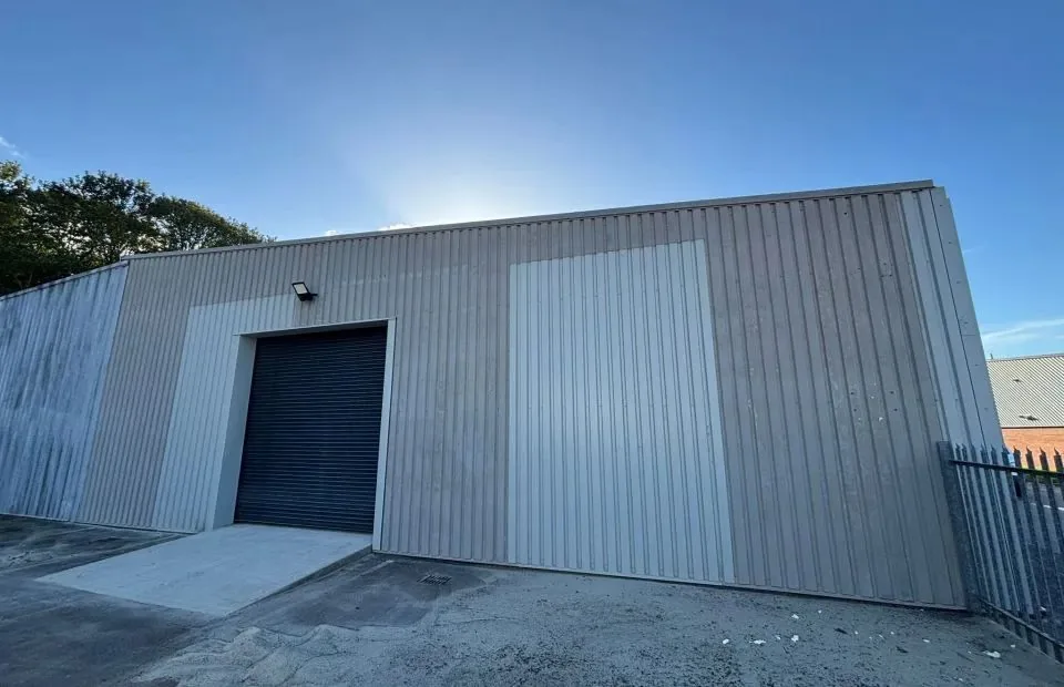 Warehouse cladding after gentle preparation with a cleaner, more even steel surface