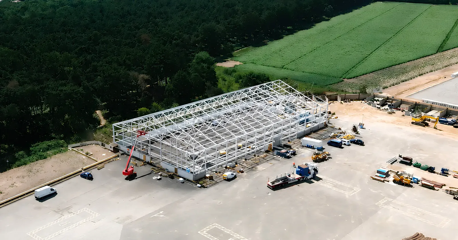 Completed warehouse site with uniformly painted structural steel and refreshed protected finish